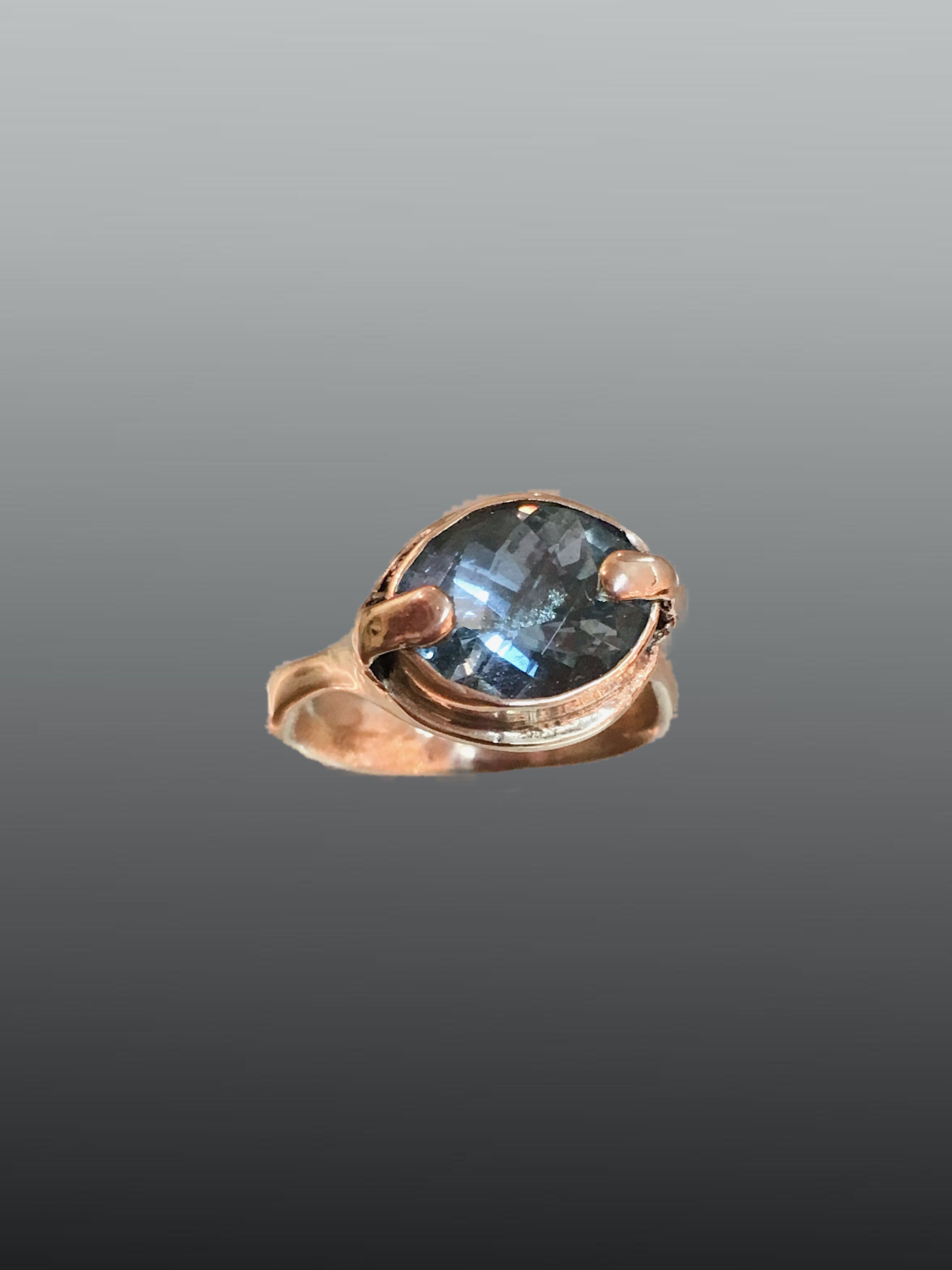 Signet style 14ky gold ring with radiant cut aquamarine